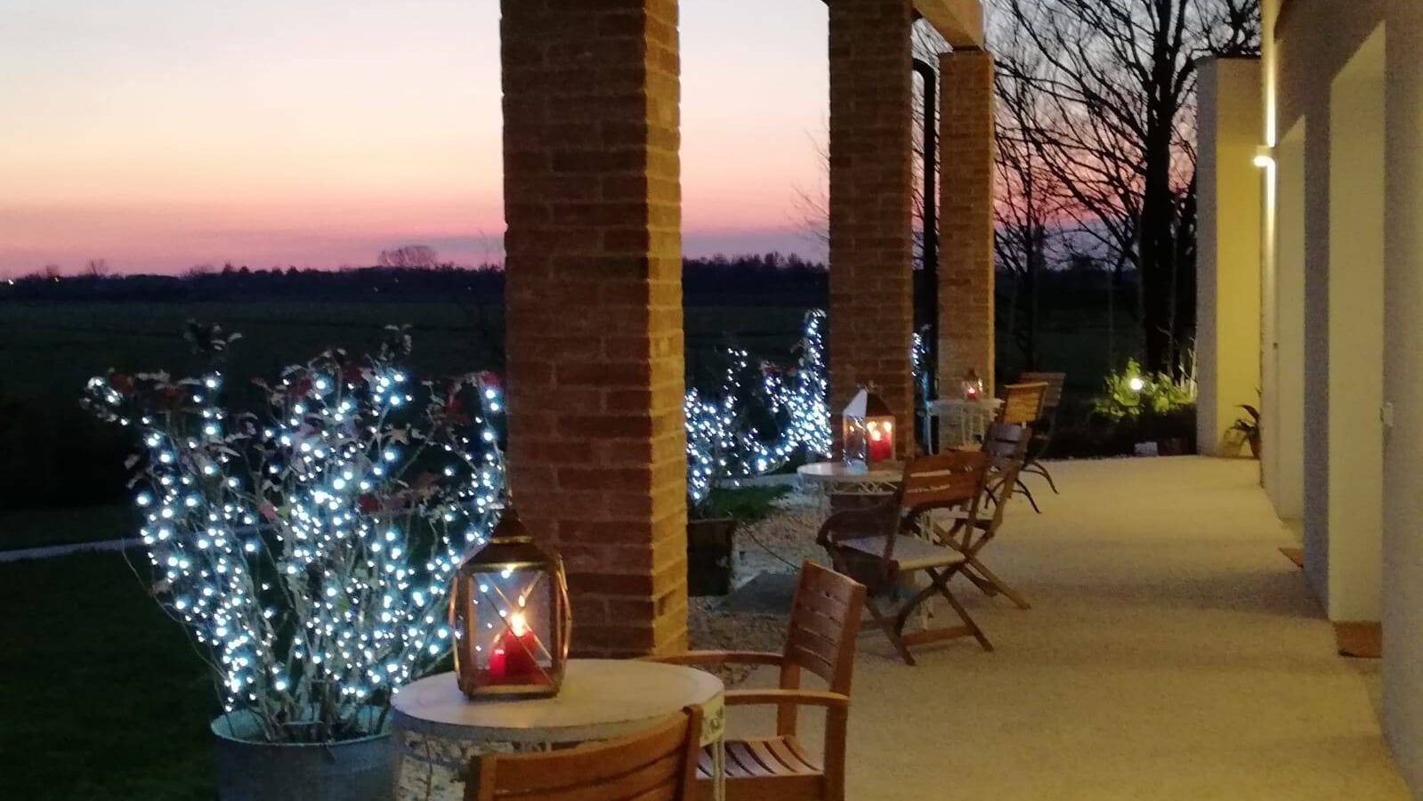 The porch lit up at sunset, Casa Fiorindo