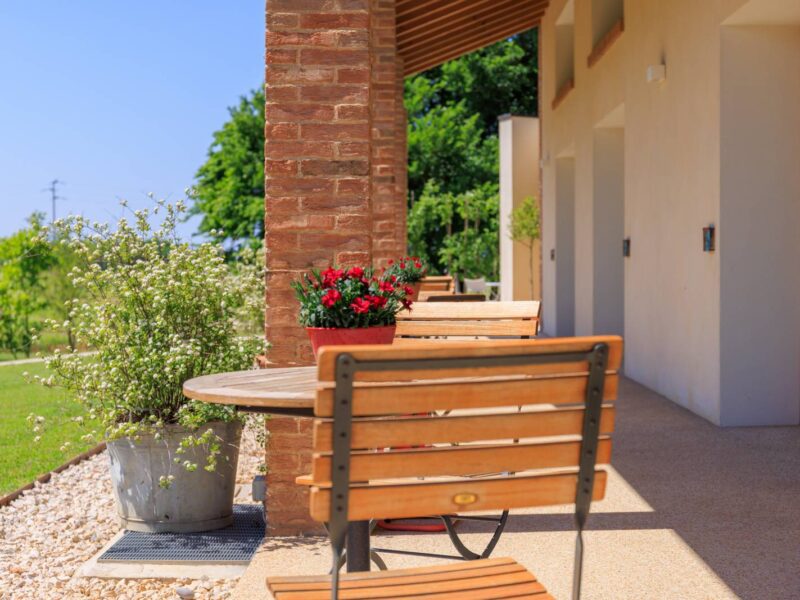 Small table under the apartments’ porch